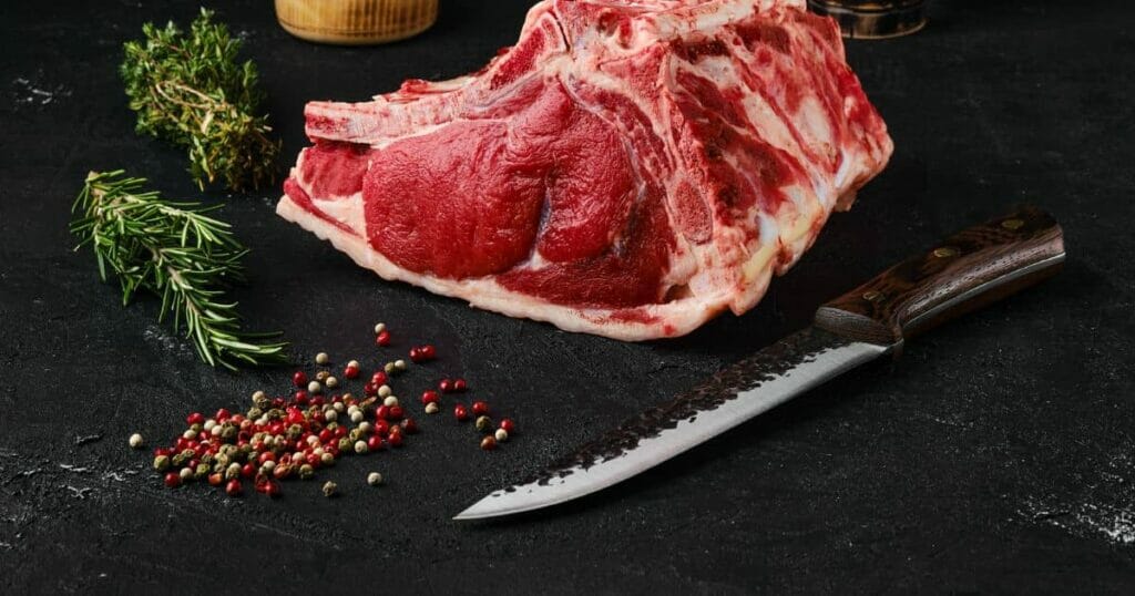 Raw Rib-Eye Steak Bone in